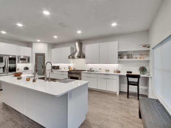 kitchen remodel in Tampa, FL with island counters cabinets floors